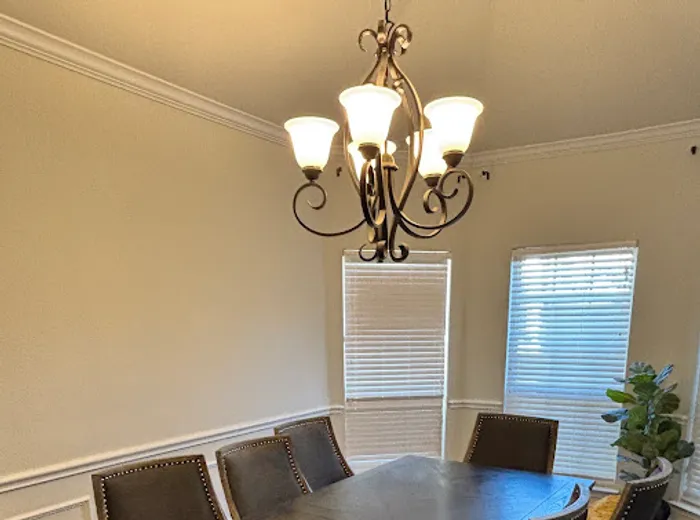 Clean dining room with table and chairs